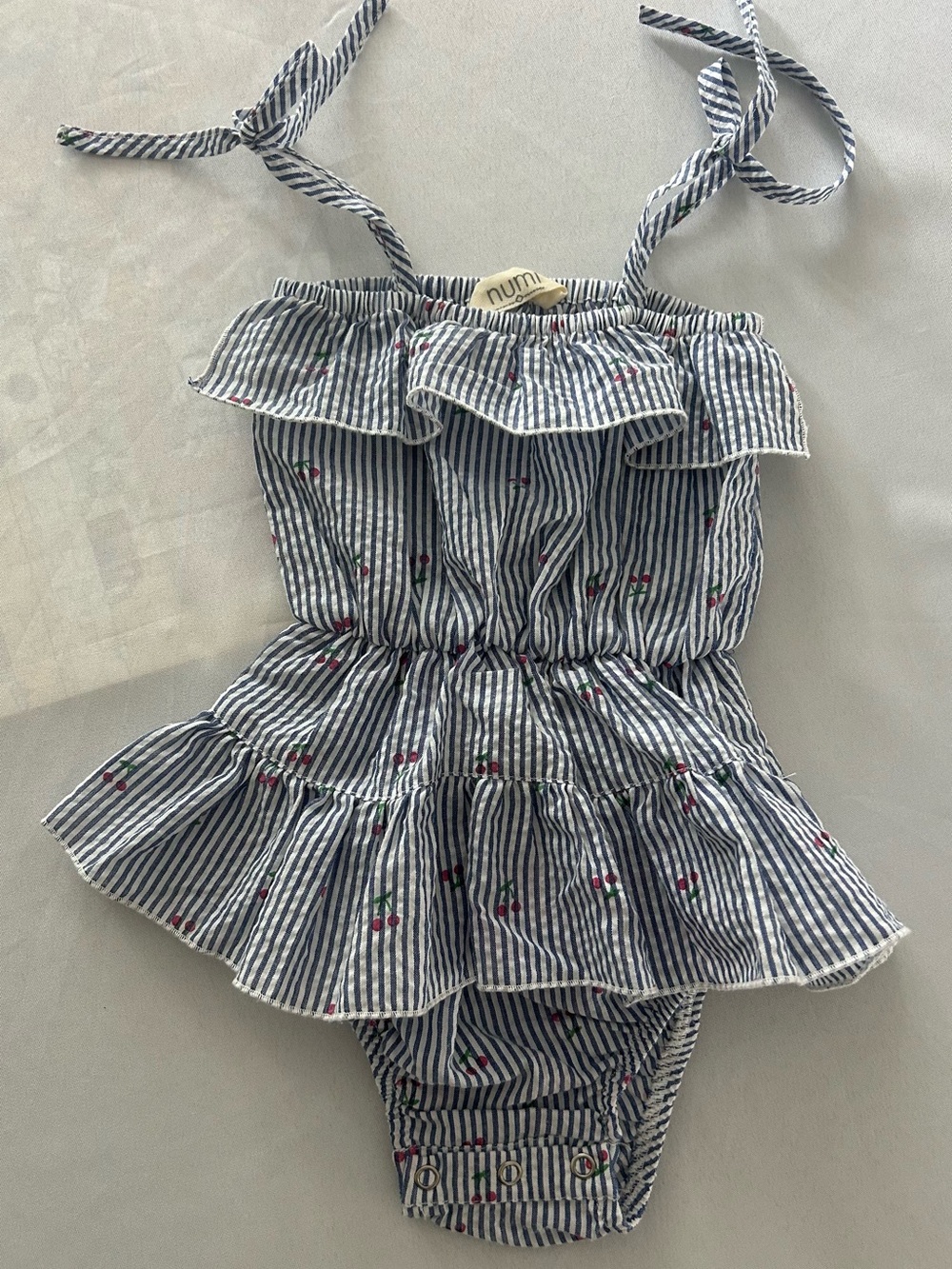 Numi Blue & White Seersucker Striped Ruffle Romper with Cherry Dots